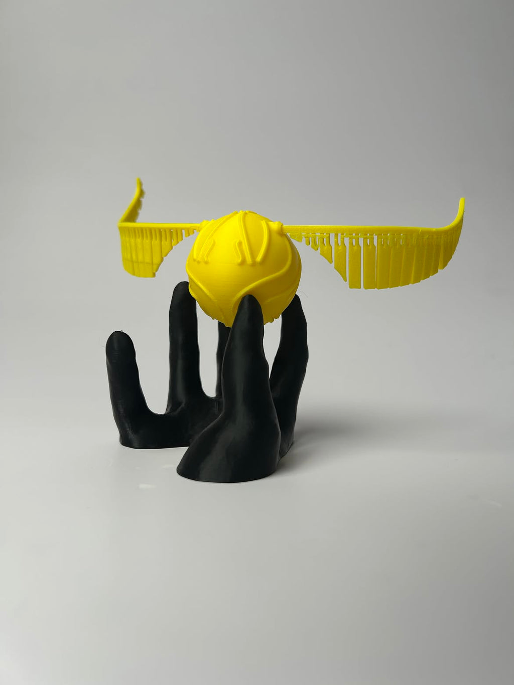 Talon & Wing — A Winged Orb in Flight