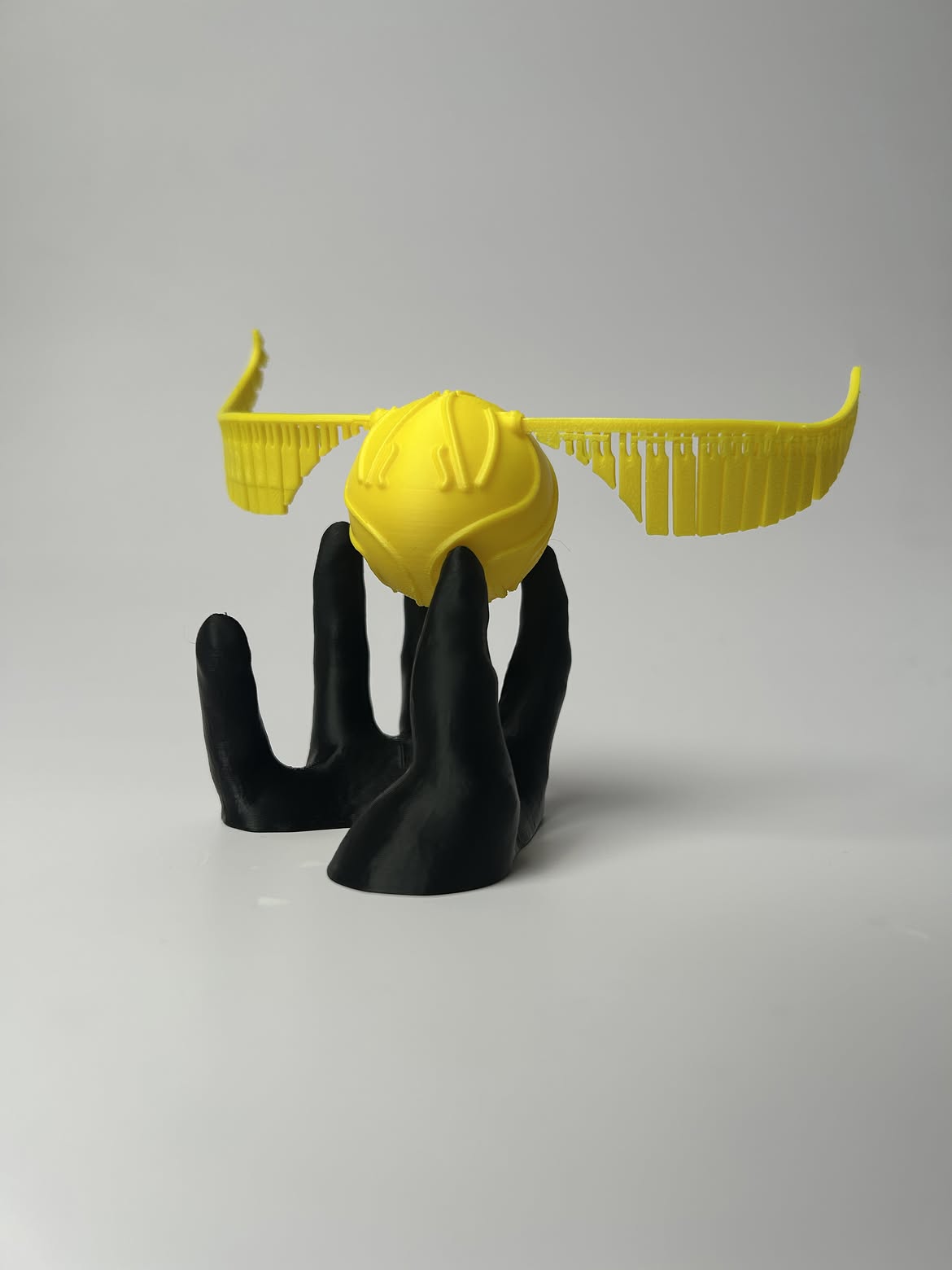 Talon & Wing — A Winged Orb in Flight